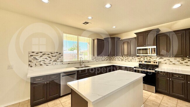 Building Photo - 4043 W Aire Libre Ave