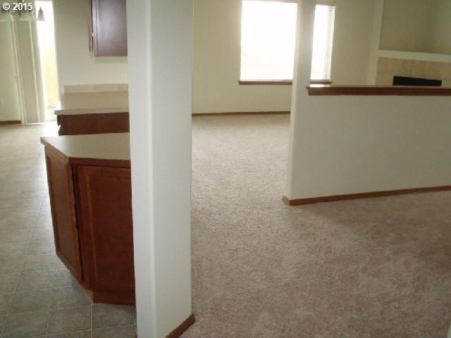 Building Photo - Spacious 4 Bedroom Home w/ Fully Fenced Yard & 2 Car Garage!
