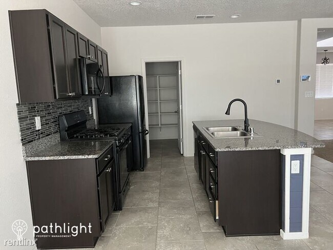 Building Photo - 4 br, 2.5 bath House - 7032 Hearthstone Ro...