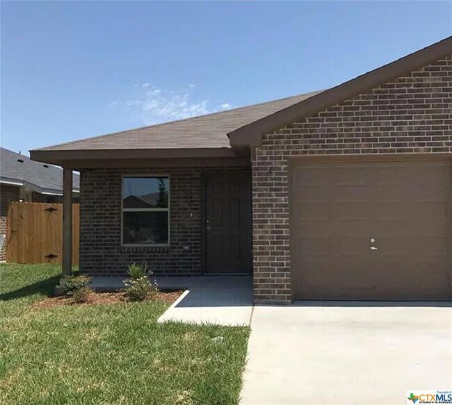 Foto del edificio - 6013 Amelia Earhart Blvd