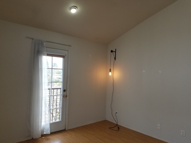 Master Bedroom with balcony and walk in close - 10748 National Pl