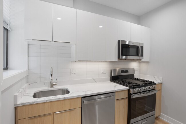 Foto del edificio - 6931 N Lakewood Ave