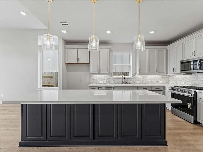 Foto del edificio - 7706 Cattail Shallows Ln