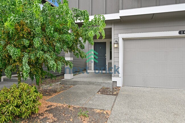 Foto del edificio - "Charming 4-Bedroom Home in Puyallup with Spacious 1831 Sq Ft Layout & 2.5 Baths!"