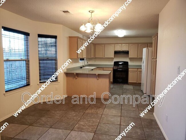 Foto del edificio - 5547 Rabadi Castle Ave NW