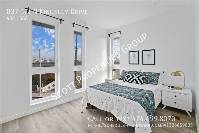 Building Photo - Modern 2-Story Townhouse: 4 Bedrooms + 4.5...