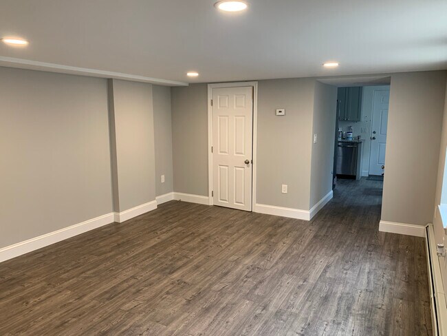 Living Room w/ half bath - 261 Main St