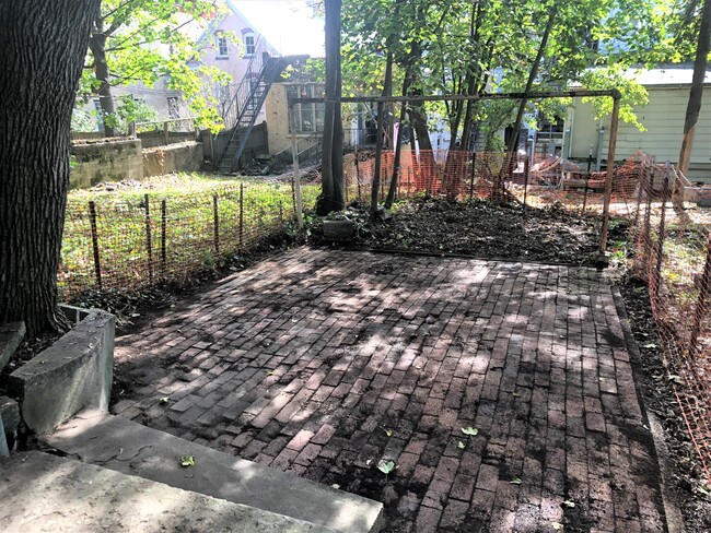 Large Brick Patio Back Yard - 314 E Dewart St