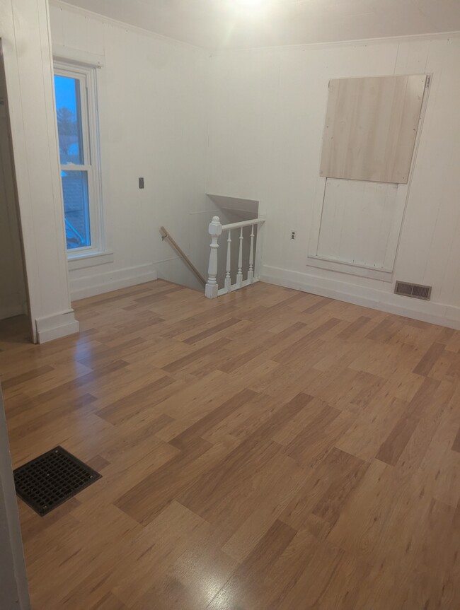 2 large bedrooms upstairs- you do walk thru one to access the second one - 210 W High St