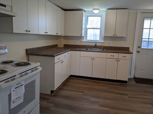 Kitchen new counters floors stove - 24 Strout St