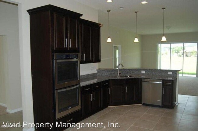 Foto del edificio - 4646 Plantation Oaks Blvd