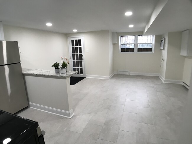 View from kitchen area to living space and entrance - 152 13th St SE
