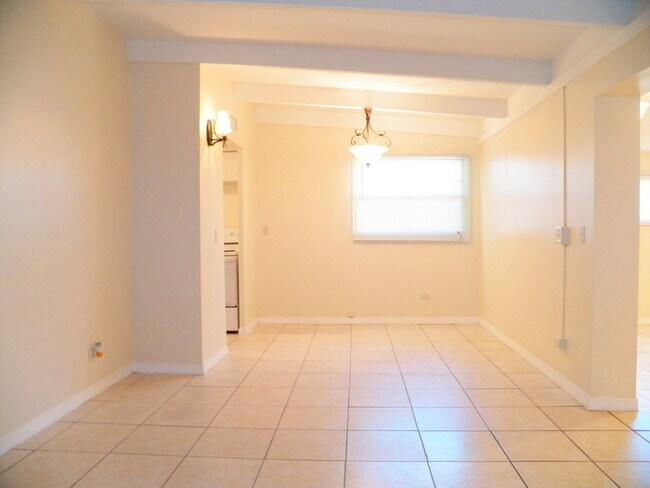 Building Photo - 3/1.5 Home with Cute Backyard!!