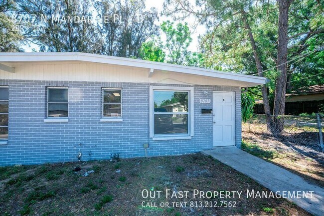 Building Photo - 8707 N Mandarine Pl