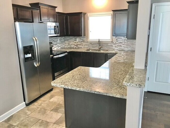 Building Photo - Now Leasing a 4 Bedroom 2.5 bath home in a...