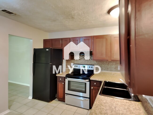 Foto del edificio - 3575 Oakvale Rd Unit 405