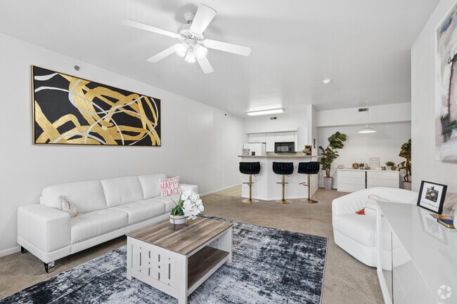 4BR, 2BA - 1,498SF - Living Room - The Pointe on College
