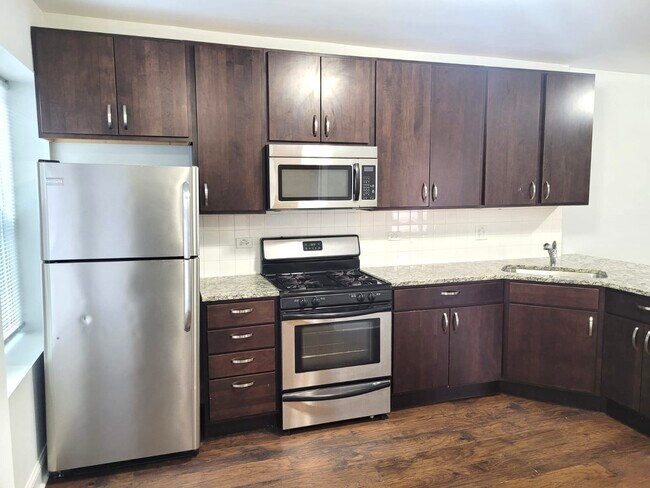 Foto del edificio - 4876 W Armitage Ave