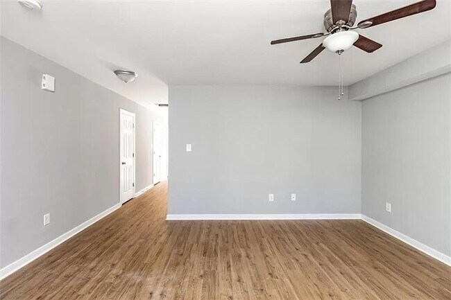 Living room (first door there is a half bath) - 3611 Enslow Ave