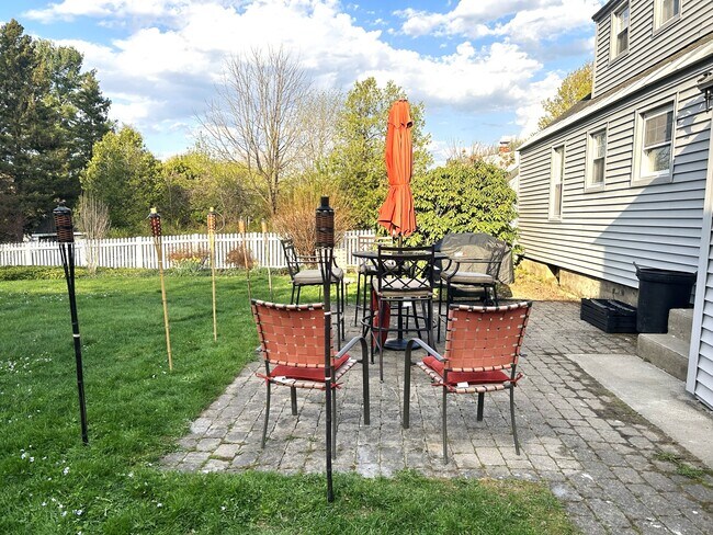 Patio, table, umbrella and extra chairs - 8 Beechwood Rd