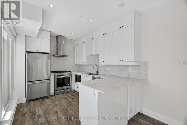 Photo du bâtiment - 200-200 Woodbine Ave
