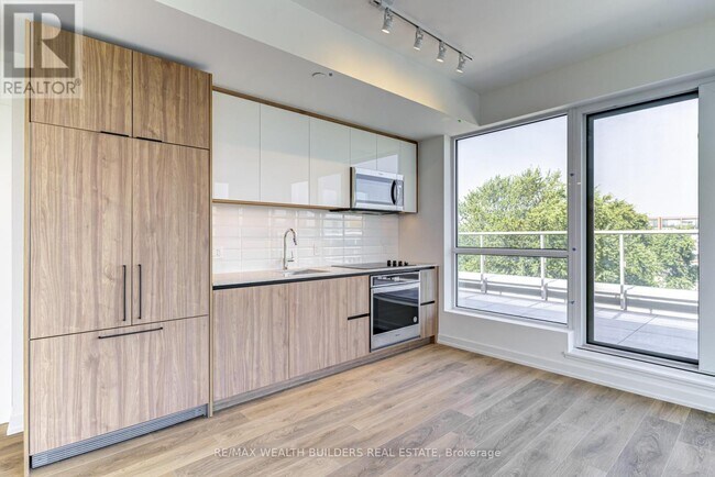 Photo du bâtiment - 150 Logan Ave