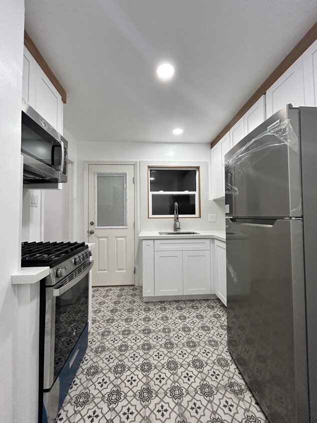 Spacious kitchen, completely renovated! - 1537 Freeman Ave