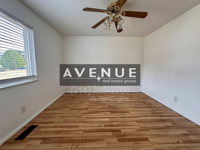 Foto del edificio - 10065 Puttington Dr