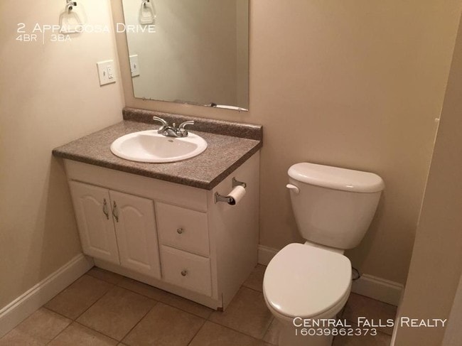 Building Photo - Available Now ! 4 Bedroom close to UNH