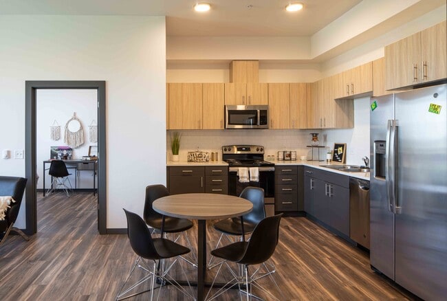 Cocina y comedor - The Flats at Chase