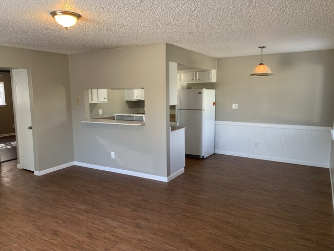 View of kitchen & dining area from living area - 1006 Faris St