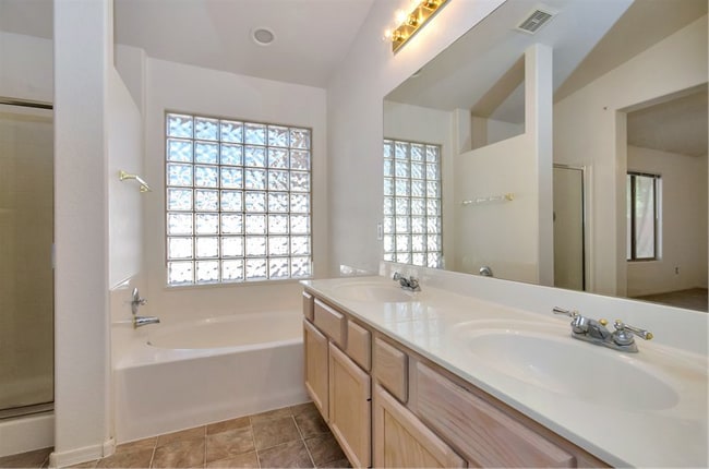 Building Photo - SOUGHT AFTER COMMUNITY OF SUPERSTITION SPRINGS VILLAGE