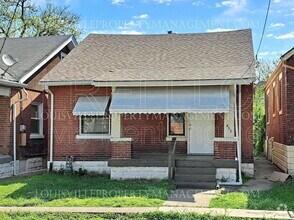 Building Photo - 731 Sutcliffe Ave