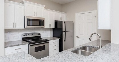 Building Photo - Grand Oasis Apartment Homes