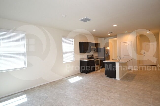 Building Photo - 37710 W Amalfi Ave