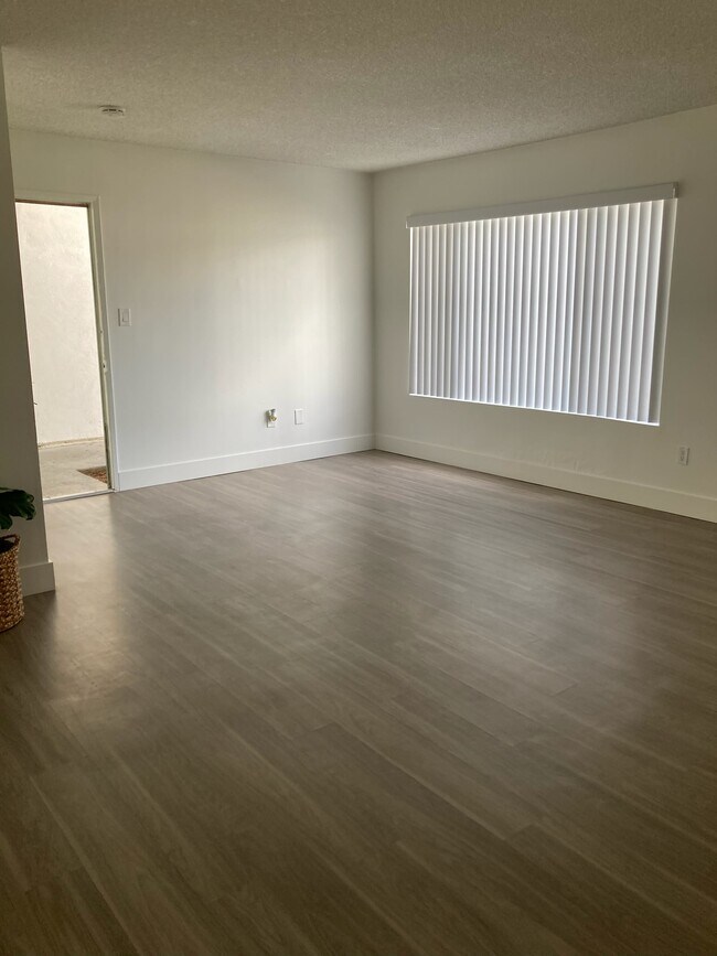 Sala de estar - Beachside Apartments