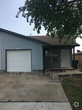 Building Photo - 10818 E 14th Ct