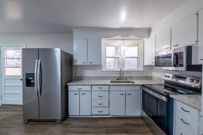 Foto del edificio - Charming 3/1 with fenced-in backyard