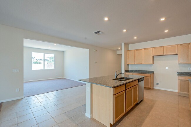 Building Photo - Beautiful New Spacious Home Includes 3 car...