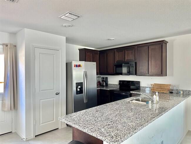 Building Photo - 6561 Alfalfa St