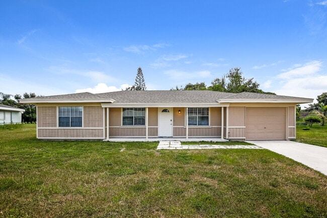 Building Photo - 325 SW Eastport Cir
