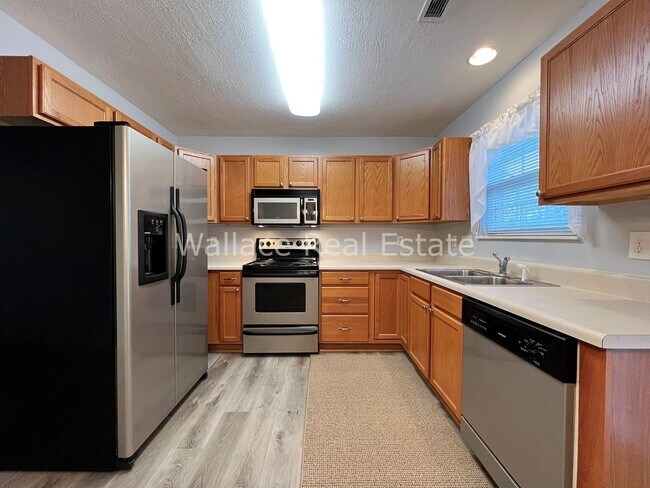 Building Photo - FOUNTAIN CITY:  2 BEDROOM, 2 BATHROOM CONDO IN MAPLE CHASE