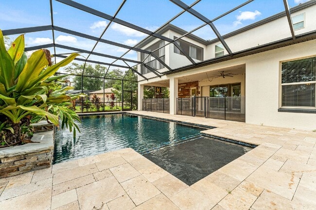 Building Photo - Luxurious 5-Bedroom Home with Office, Thea...