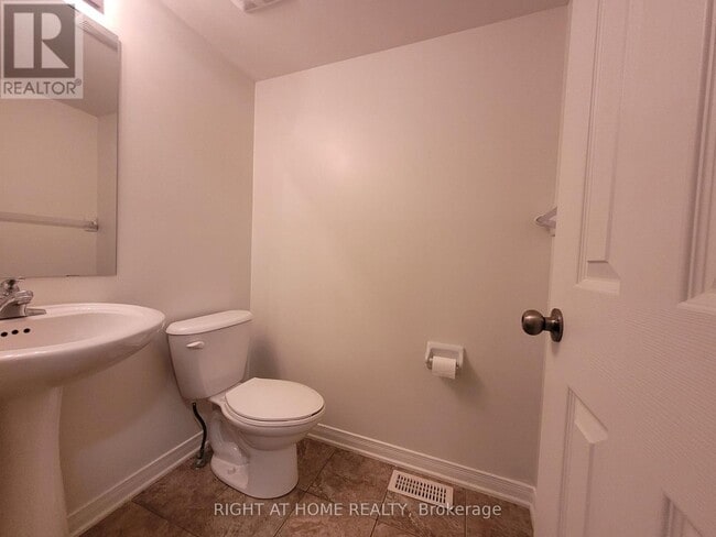Building Photo - 204 Rolling Meadow Crescent