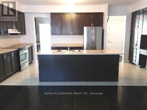 Photo du bâtiment - 10619 Woodbine Ave