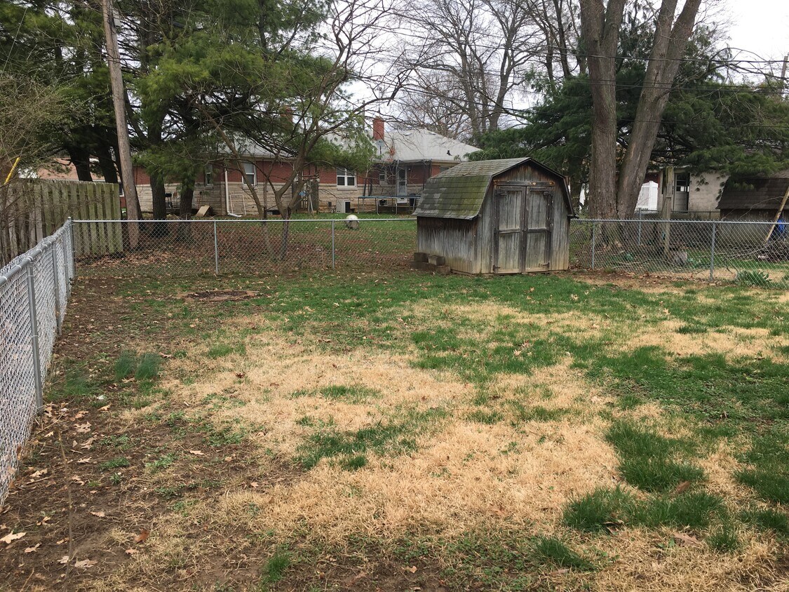 Fenced in backyard and storage barn - 5922 W 16th St