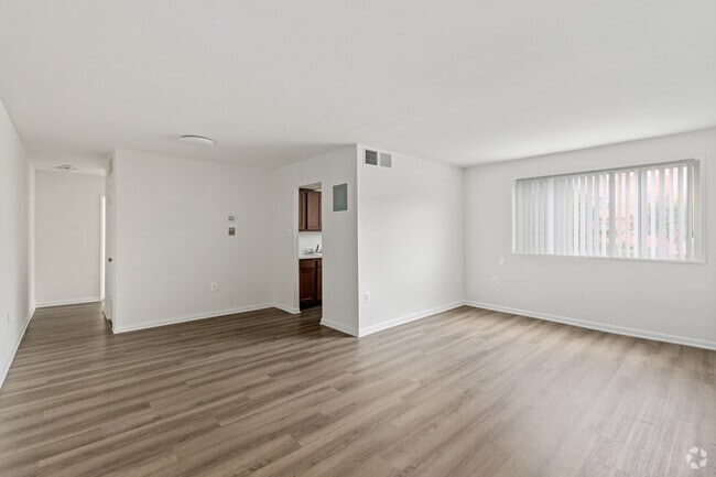 2BR, 1BA - 900SF - Living Room - Queens Park Plaza Apartments