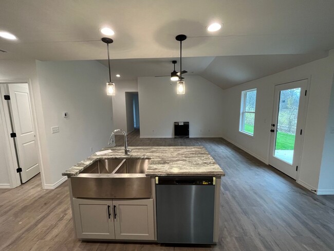 Building Photo - BRAND-NEW 3-bedroom, 2-bath home with Spri...