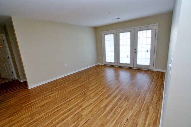 Living Area with Doorwall - Alton Place Apartments