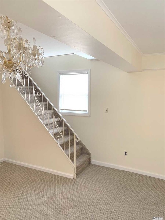 Building Photo - 218-24-218-39 39th Ave